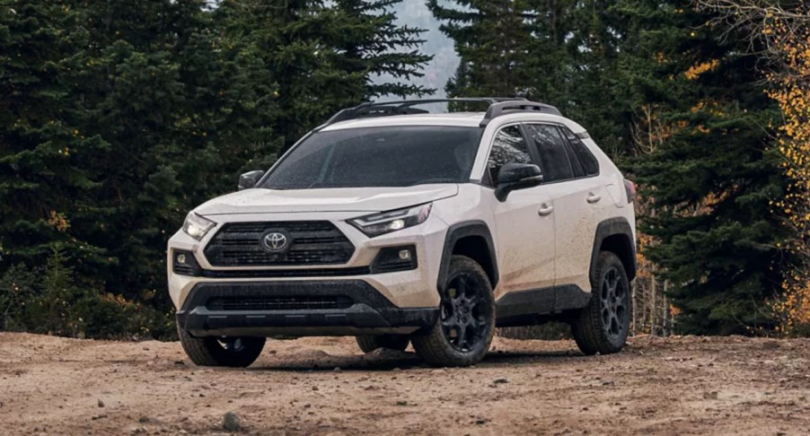 A white 2022 Toyota RAV4 XLE Premium compact SUV is parked outdoors.