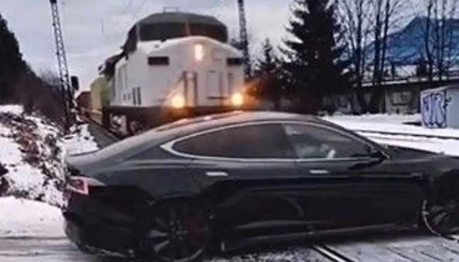 Train vs Tesla