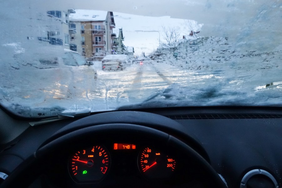 A frozen car windshield in the winter