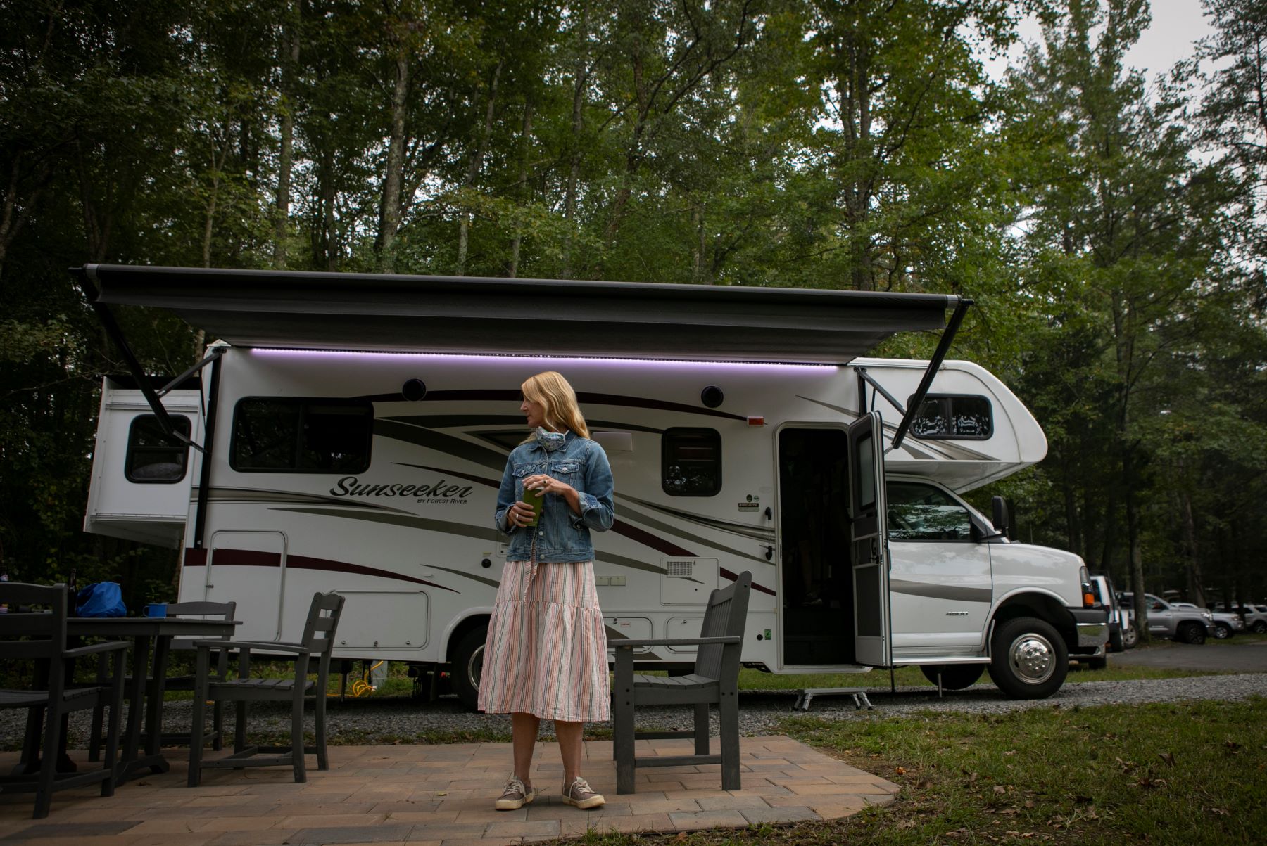 Washington Post travel writer Andrea Sachs with a rented RV parked at a KOA campground