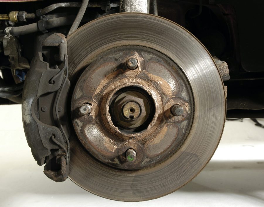 A rusty brake rotor and caliper