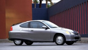 Silver 2002 Honda Insight shot from passenger side