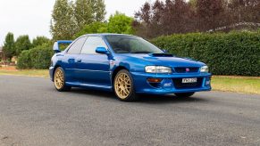 A blue 1998 Subaru Impreza 22B STi on an Australian street