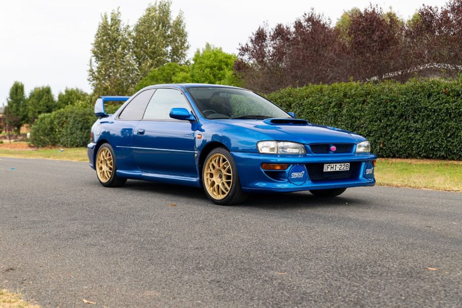 A blue 1998 Subaru Impreza 22B STi on an Australian street