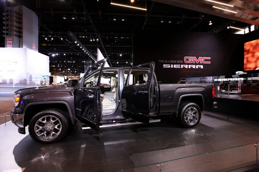 A 2014 GMC Sierra 1500 at an autoshow. It's one of the model years to avoid buying.