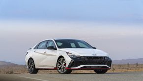 A light-blue 2022 Hyundai Elantra N on a desert racetrack