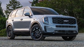 A gray 2022 Kia Telluride midsize SUV is parked.