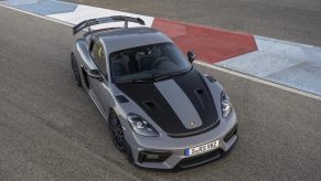 An overhead view of a gray-and-black 2022 Porsche 718 Cayman GT4 RS with the Weissach Package