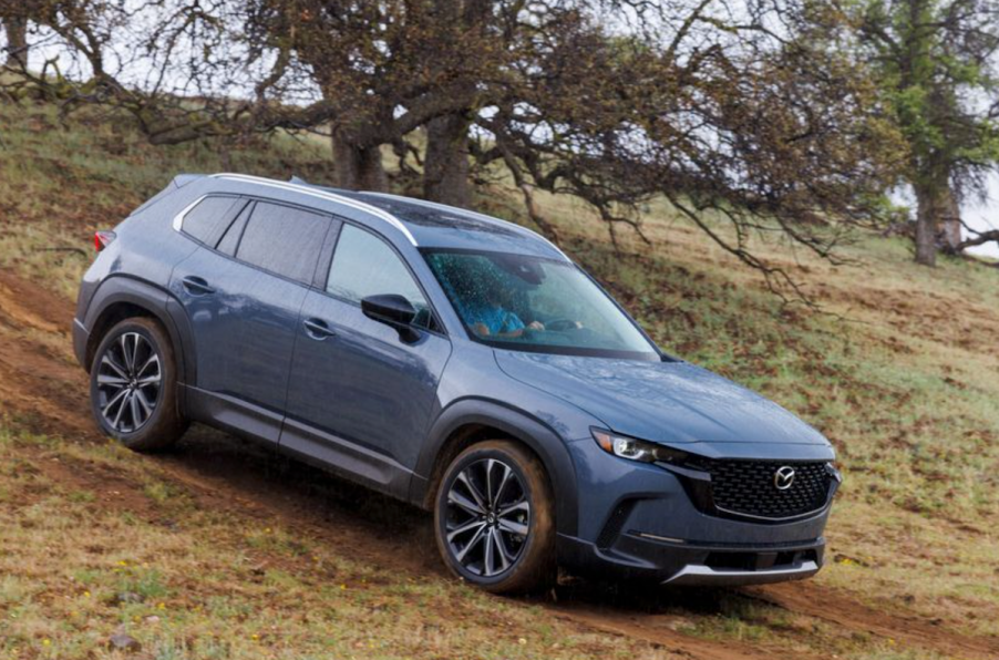 The 2023 Mazda CX-50 on a dirt road