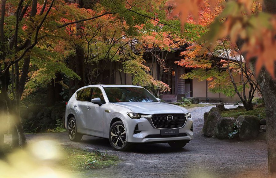 2023 Mazda CX-60 parked near a home