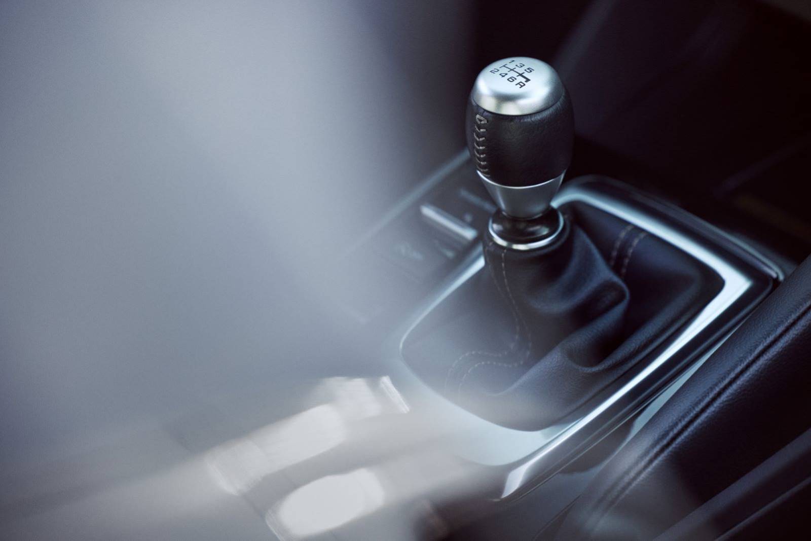 Close up view of a manual transmission shifter in the cabin of the 2023 Acura Integra A-Spec w/Technology Package