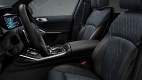 This is a black leather interior in a BMW X7 luxury suv.