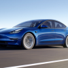 Blue 2022 Tesla Model 3, one of the safest luxury cars to buy in 2022, driving by mountains