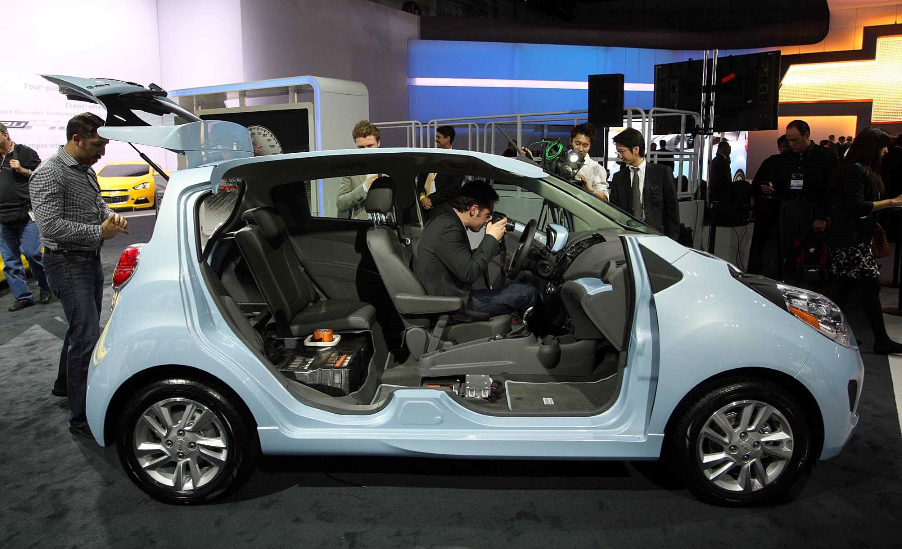 The interior of a Chevy Bolt EV and its under the floor battery that provide electric driving range