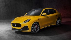 Front angle view of yellow 2023 Maserati Grecale, highlighting its release date and price