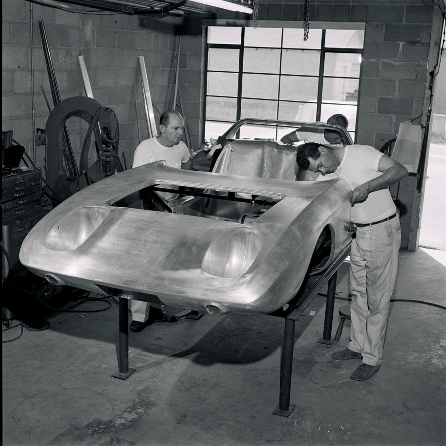 Tom Barnes, at left and Dick Troutman beat out final panels for the first ever Mustang concept car in their Culver City shop