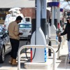 Filling up at a gas station