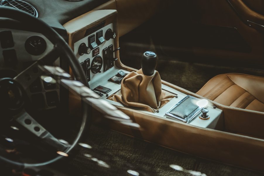 Clean car interior with vintage leather seats.