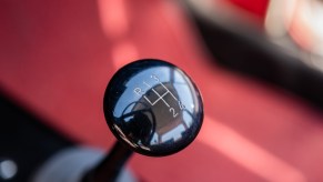 Closeup of a manual transmission truck's shift lever.