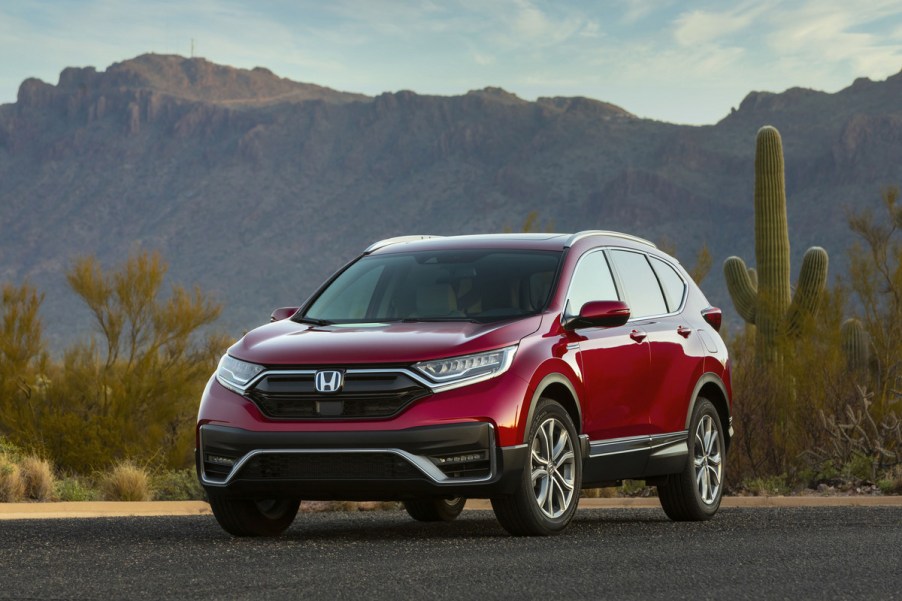 Red 2022 Honda CR-V Hybrid with a desert landscape in the background