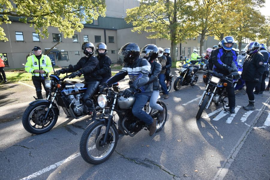 Gear-clad riders and passengers on motorcycles take part in a 'ride of respect' in the UK