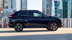 Side view of black Mitsubishi Eclipse Cross, the best SUV to buy used instead of new in 2022 due to high depreciation