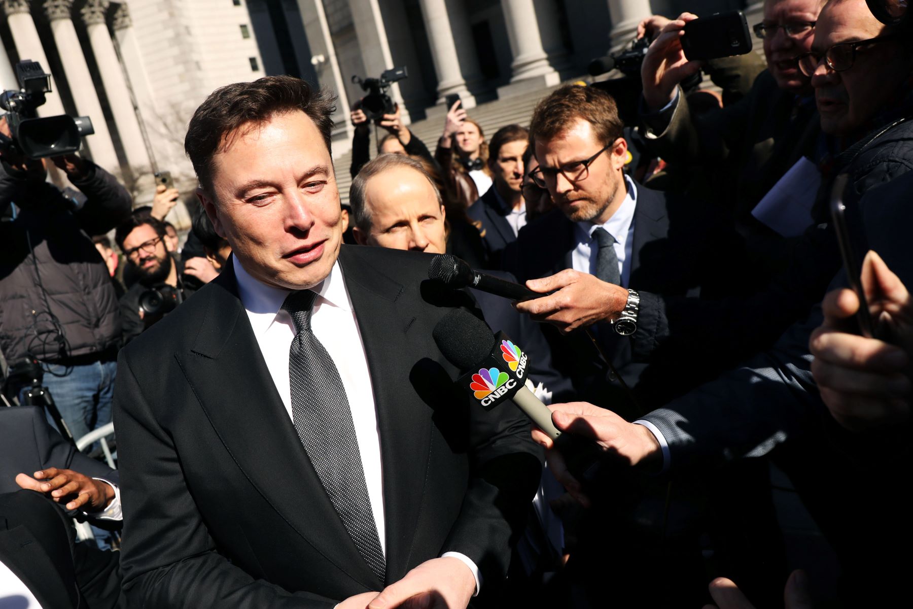 Tesla CEO Elon Musk leaving court after attending a hearing for a tweet on social media