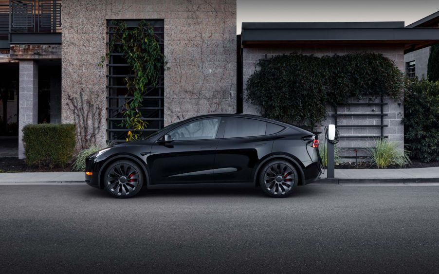 A Tesla Destination Charger (not a Tesla Supercharger) charging a Tesla Model Y electric vehicle