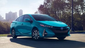 A blue 2022 Toyota Prius Prime is parked.