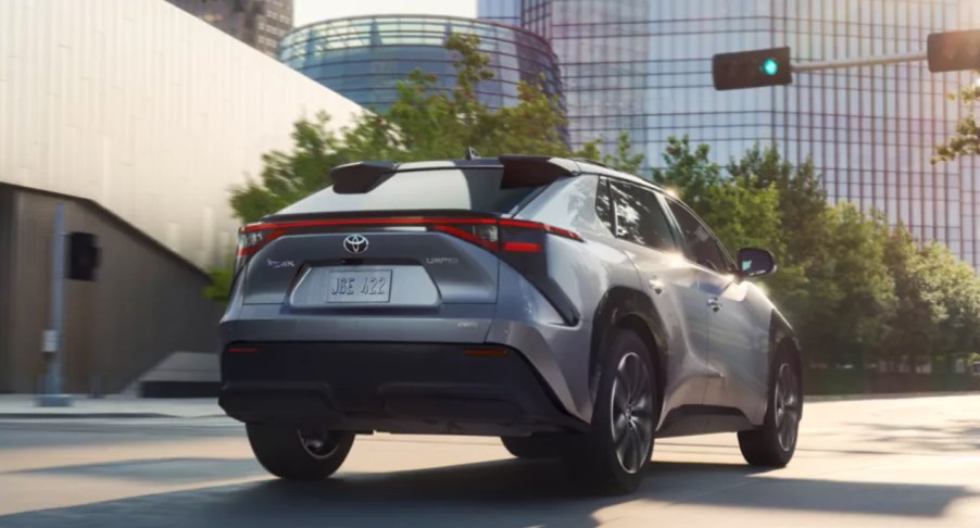 The back of a silver 2023 Toyota bZ4X electric SUV.