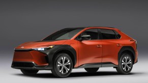 A red 2023 Toyota bZ4X XLE electric SUV.