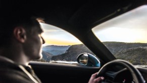 A Porsche driving doesn't wear sunglasses while driving