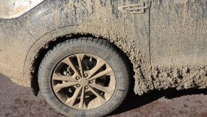 A car with caked on mud and dirt