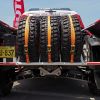 A rack of spare tires in the back of a pickup truck for the Rally Dakar in Lima, Peru