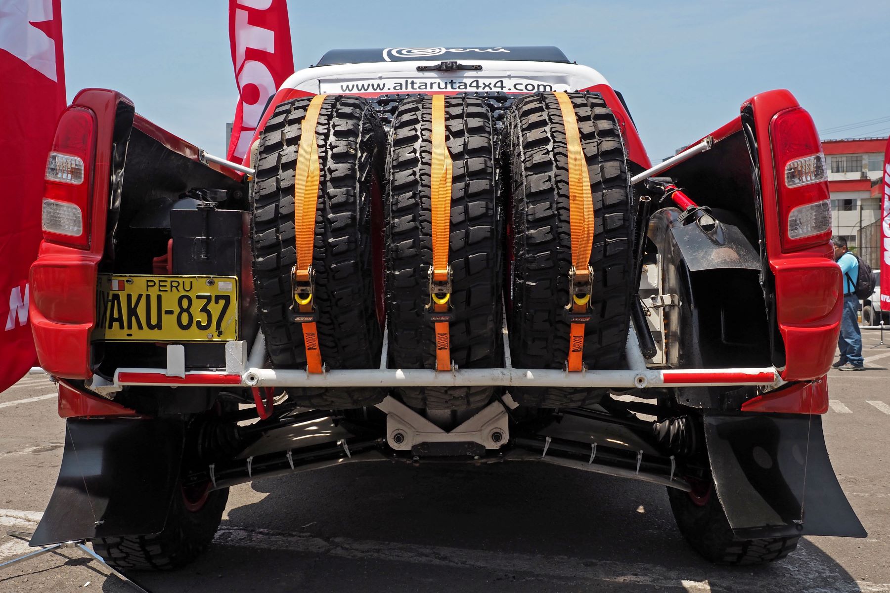 A rack of spare tires in the back of a pickup truck for the Rally Dakar in Lima, Peru