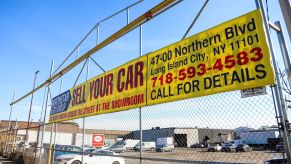 A Queens, New York City used car dealership lot in January