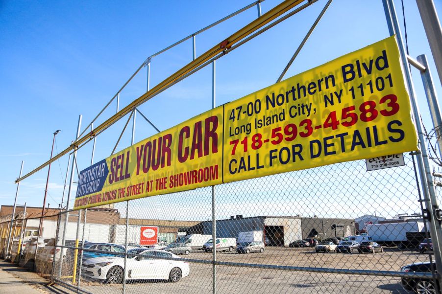 A Queens, New York City used car dealership lot in January