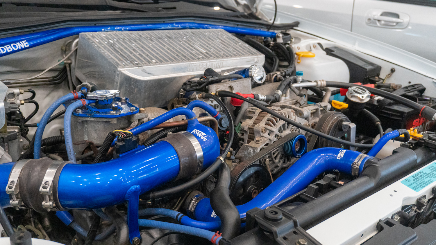 2002 Subaru WRX EJ20 turbo engine with modifications, engine bay shot