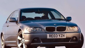 A gray 2004 BMW 325Ci on pavement