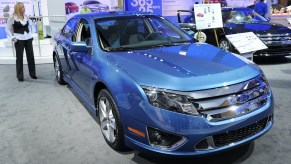 2010 Ford Fusion Hybrid on a showroom floor