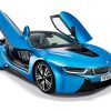 A blue 2015 BMW i8 with its gullwing doors up