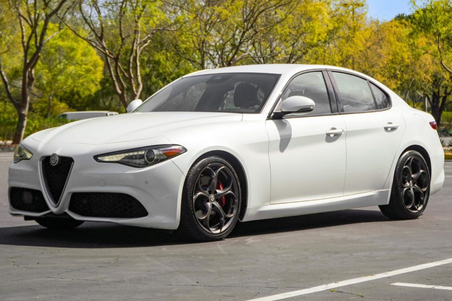 A white 2018 Alfa Romeo Giulia Q2 Ti Sport in a parking lot