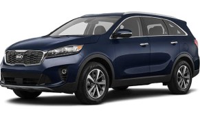 A dark blue 2019 Kia Sorento against a white background.