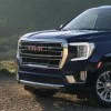 A black 2022 GMC Yukon XL on a mountain top.