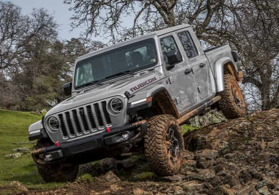 The 2022 Jeep Gladiator off-roading in mud