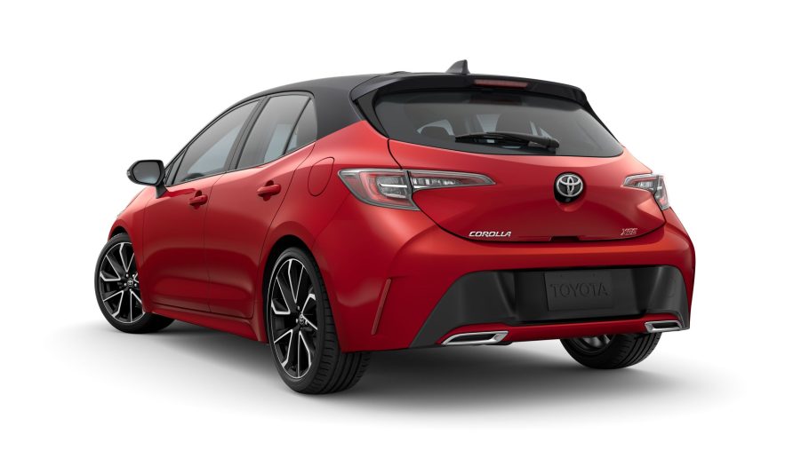 The rear 3/4 view of a red 2022 Toyota Corolla XSE Hatchback