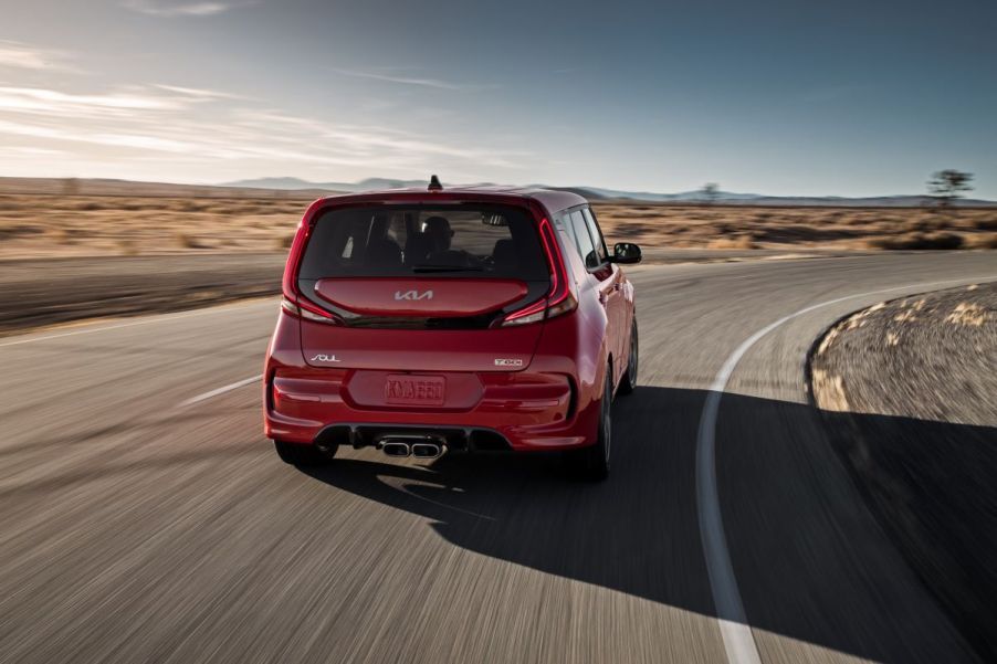 Rear view of a red 2022 Kia Soul hatchback, one of the best rental cars