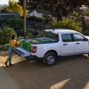 The 2022 Ford Maverick XL is a basic compact pickup truck. Here it has soil loaded into its bed.