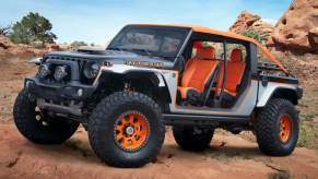 The 2023 Jeep Gladiator Bob Concept climbing over rocks