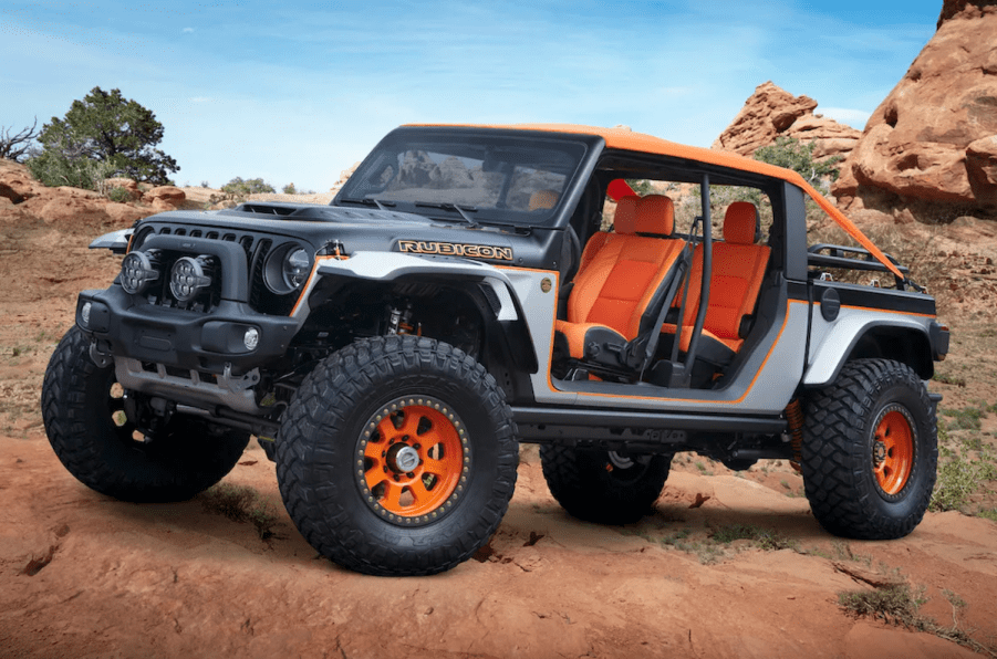 The 2023 Jeep Gladiator Bob Concept climbing over rocks